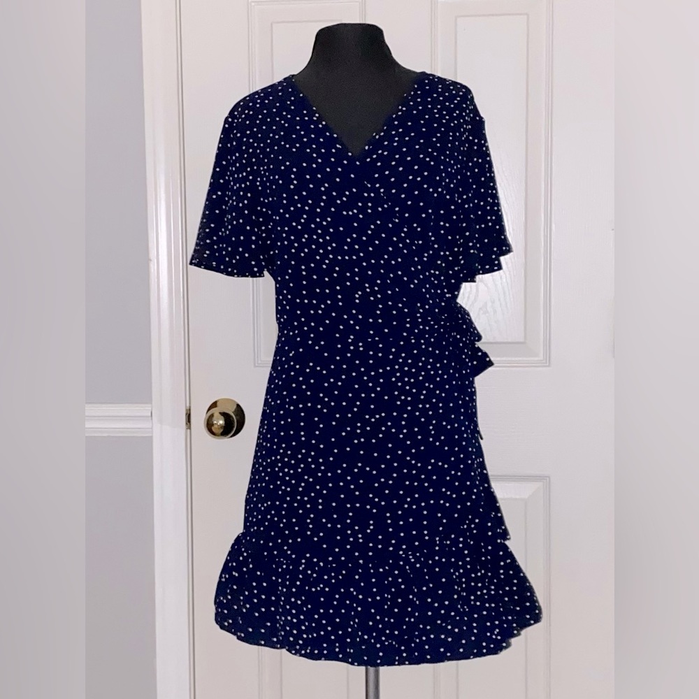Navy wraparound dress with white polka dots
